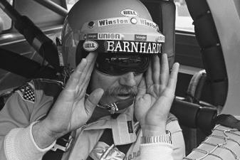 Dale Earnhardt communicates with his pit crew at Bristol Motor Speedway.