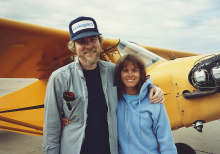 Peter and Barbara Egan in front of their Piper Cub